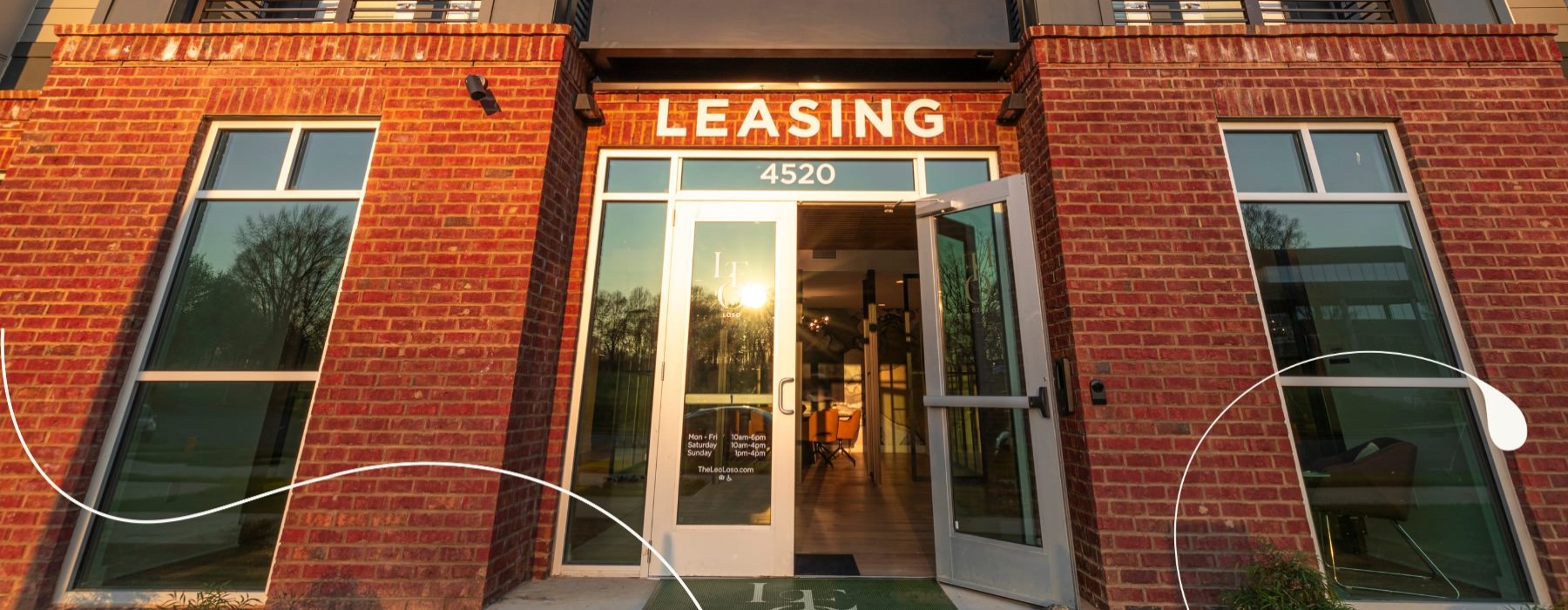 a leasing building with an open door